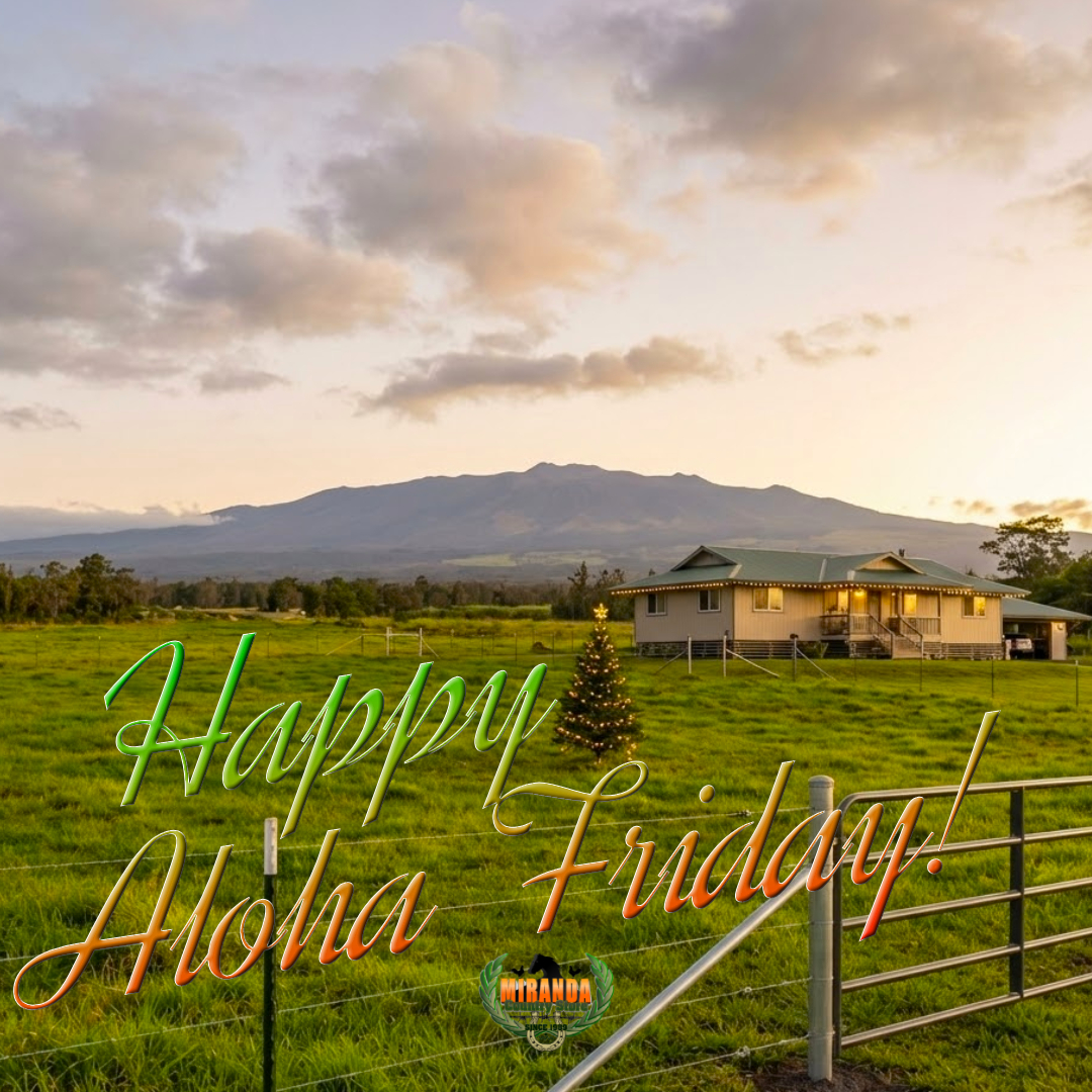 A scenic Hawaiian landscape at sunset with Mauna Kea mountain in the background, featuring a lush green field, a wooden fence in the foreground, a single-story house with lights on and a green roof, and a decorated Christmas tree. Overlaid text in a colorful gradient reads "Happy Aloha Friday!" with the Miranda logo in the bottom right.